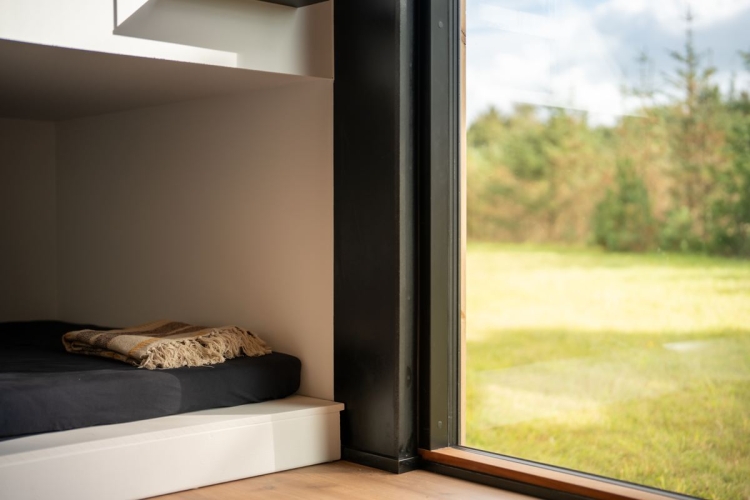 Lille sommerhus med hyggelig soveplads